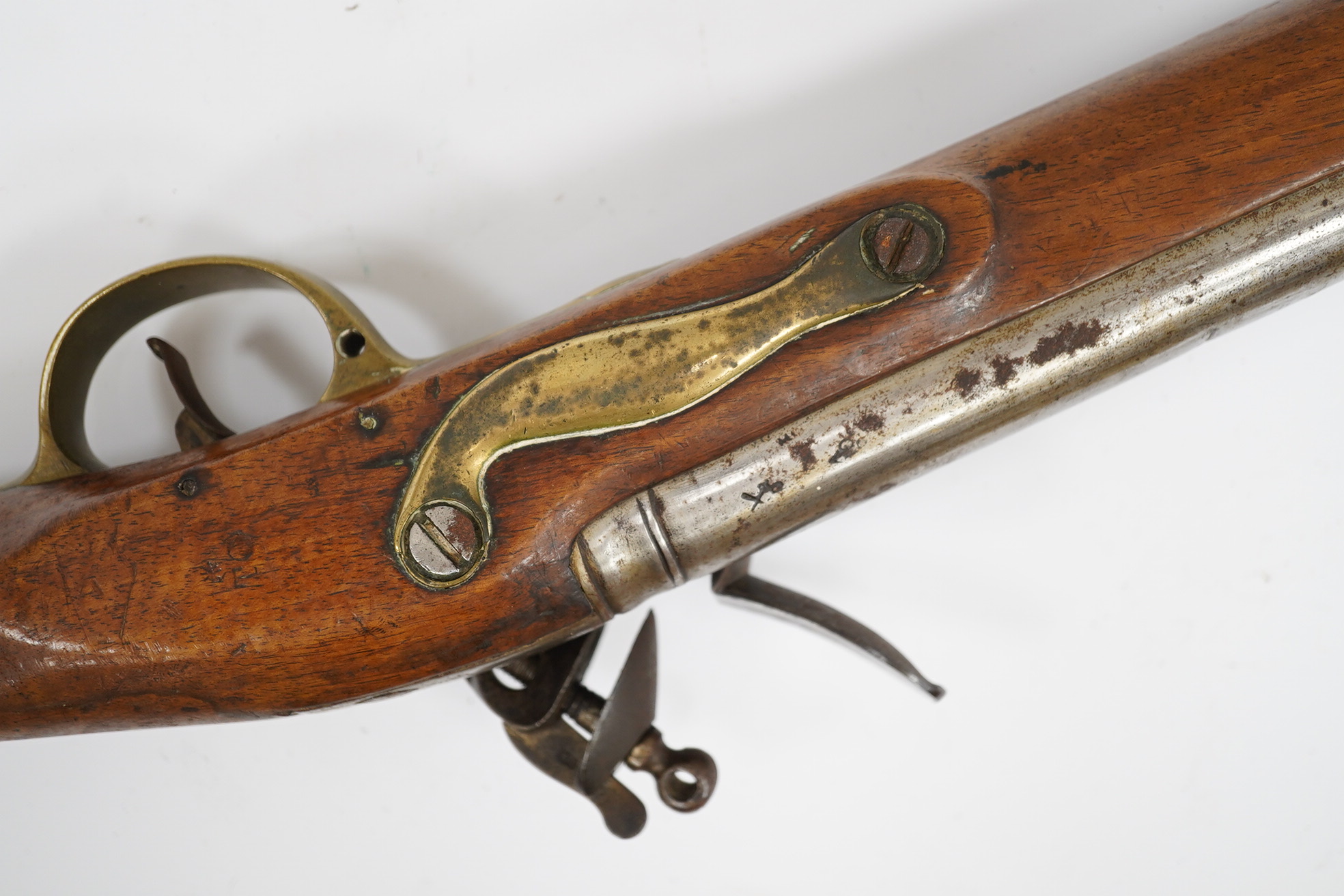 A ten bore flintlock musket of Brown Bess type, barrel 88cm, lock struck with crowned GR and Tower, regulation brass mounts. Condition - fair